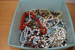 A collection of costume necklaces including various beaded examples, faux pearls etc.