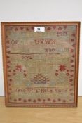 A Victorian needlework alphabet sampler, stitched by Jane Reed, framed and under glass, measuring