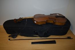 A traditional violin, labelled John G Murdoch, London - The Maidstone, with bow but no case