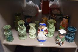 A collection of thirteen pottery 'Toby' jugs, various to include Burlington, Avon Ware, and a silver