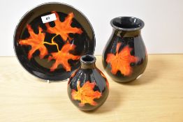 Two 20th Century Poole pottery vases and dish, in the Forest Flame pattern, the largest vase