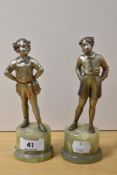Two early 20th Century bronze studies of young boy and girl on stepped onyx bases, each measuring