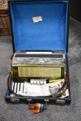 An Eastern European accordion , with hard case