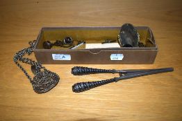 A pair of Victorian white metal glove stretchers, a chatelaine clip, a vacant white metal oval broo