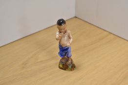 A Royal Worcester bone china figure 'Burman' designed by F.G Doughty for the Children of the World