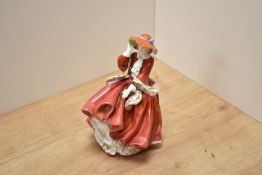 A Royal Doulton bone china figurine Top o'the Hill figurine, HN1834, windswept female in red dress