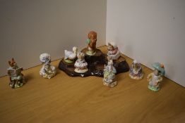 A collection of nine Royal Albert Beatrix Potter figures, to include Benjamin Bunny, Lady Mouse made