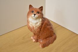 A Beswick Pottery Persian Cat study, seated looking up, number 1867, designed by Albert Hallam in