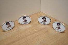 A group of four Royal Doulton bone china 'The 14th International Royal Doulton & Beswick