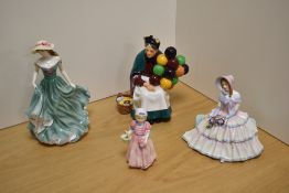 A group of four Royal Doulton bone china figurines, comprising Tinkle Bell HN1677, Daydreams HN1731,