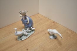 A Lladro porcelain figure group Hurry Now 5503 together with goose figure Hissing
