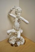 A 20th century Spanish Franju pottery figure, depicting a drunken tramp, impressed marks to