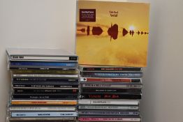 A large box of compact discs as in photos - some decent potential here for resale - all bases