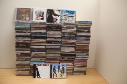 A large selection of compact discs as per photos with good resale potential - rock , pop , indie and