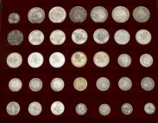 A collection of GB Silver Coins including Elizabeth I 1575 Sixpence, Half Crowns 1825, 1887 x2,