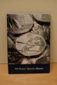 A Queen Elizabeth II London Olympics 50p Coin Collection, 15 coins in total, in a Lighthouse folding