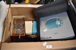 A Canon LV-S1 projector and a selection of projector accessories, a vintage Craig splicer and a