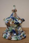 A 19th Century Palissy sponge ware lidded pot, measuring 20cm tall