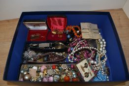 An assortment of costume jewellery including earrings of various design for pierced and non-
