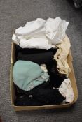 A collection of vintage and antique clothing, remnants and similar, including beadwork and