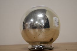 A vintage witch gazing glass ball, of occult interest.
