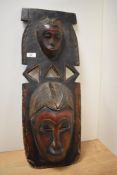 An African carved wooden totem mask.