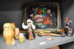 A 20th Century Russian design tray, hand decorated with flowers against a black ground, measuring