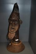 An impressive Nigerian / Benin / Yoruba cast bronze memorial head with closed eyes and stylistic