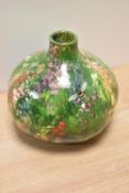 A hand painted gourde, having detailed insects and animals painted in a country garden scene, signed