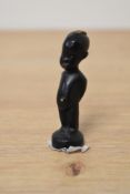An English cast bronze figure of an African child, gilt embellishment to lips, belly button and