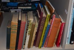 A selection of books, including vintage Daily Mail annual for boys and girls and reference books