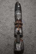 An African vintage carved handmade wall mask having metal decoration 82cm x 12cm.