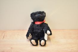 A modern Steiff Limited Edition Teddy Bear, 663888 Titanic Centenary Bear, No 1216 with button, tag,