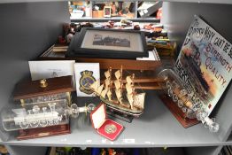 A shelf of Railway Prints, Reproduction Aimer's Coffee Essence Advertising Sign, Trains in