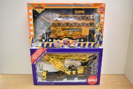 A Siku 4310 1:55 scale Die-cast, Latticed Mast Crane in original box along with a Smart Toys
