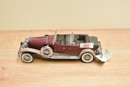 A 1987 Franklin Mint 1:24 scale Die-cast, 1930 Duesenberg J Derham Tourster with tag and