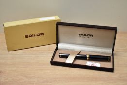 A Pilot Custom GT pump fill fountain pen in black with narrow and broad band to cap having Pilot 14k