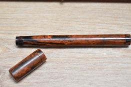 A boxed Atlantic No.9 red and black ripple safety eye dropper fill fountain pen with a retractable