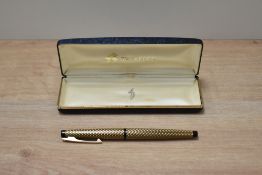 A boxed Sheaffer Lady 904 push button converter fill in Paisley gold black having Sheaffer Palladium
