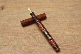 A Valco Porte Plume lever fill fountain pen in black and red hard rubber having Gold Starry 18ct 1st