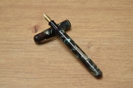 A Waterman Ideal Junior lever fill fountain pen in green marble having Waterman 14ct W-2B nib.