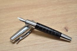 A Faber-Castell E-Motion converter fill fountain pen with spring clip to cap and crocodile skin