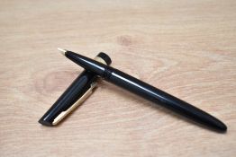 A boxed Waterman 300 bladder fill fountain pen in black having a 14ct hooded nib.