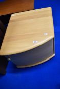 A modern beech corner base unit of small proportions