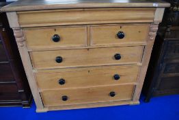 A Victorian stripped pine chest of two over three drawers, approx W125 H117cm