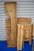 A Victorian style pine single bed, of cabin, slot construction, with later slats