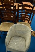 A Lloyd Loom tub chair