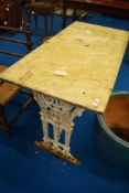 A Victorian metal framed table with marble top