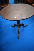 A 19th Century oak pedestal table, having circular on turned column with triple splay legs ,