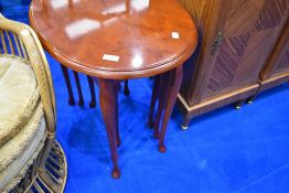 A reproduction nest of three tables